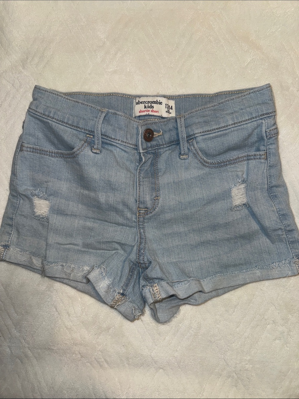 abercrombie kids faded light blue distressed denim shorts